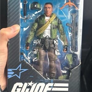 Action Figure with Green Jacket